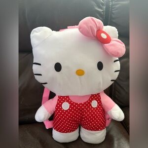 Hello Kitty Plush Toy with Pink Bow and Red Outfit. Used in perfect condition